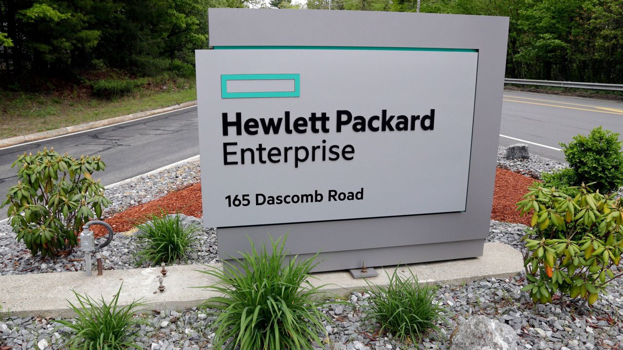 A sign marks the entry way into Hewlett Packard Enterprise Tuesday, May 24, 2016, in Andover, Mass. (AP Photo/Elise Amendola)