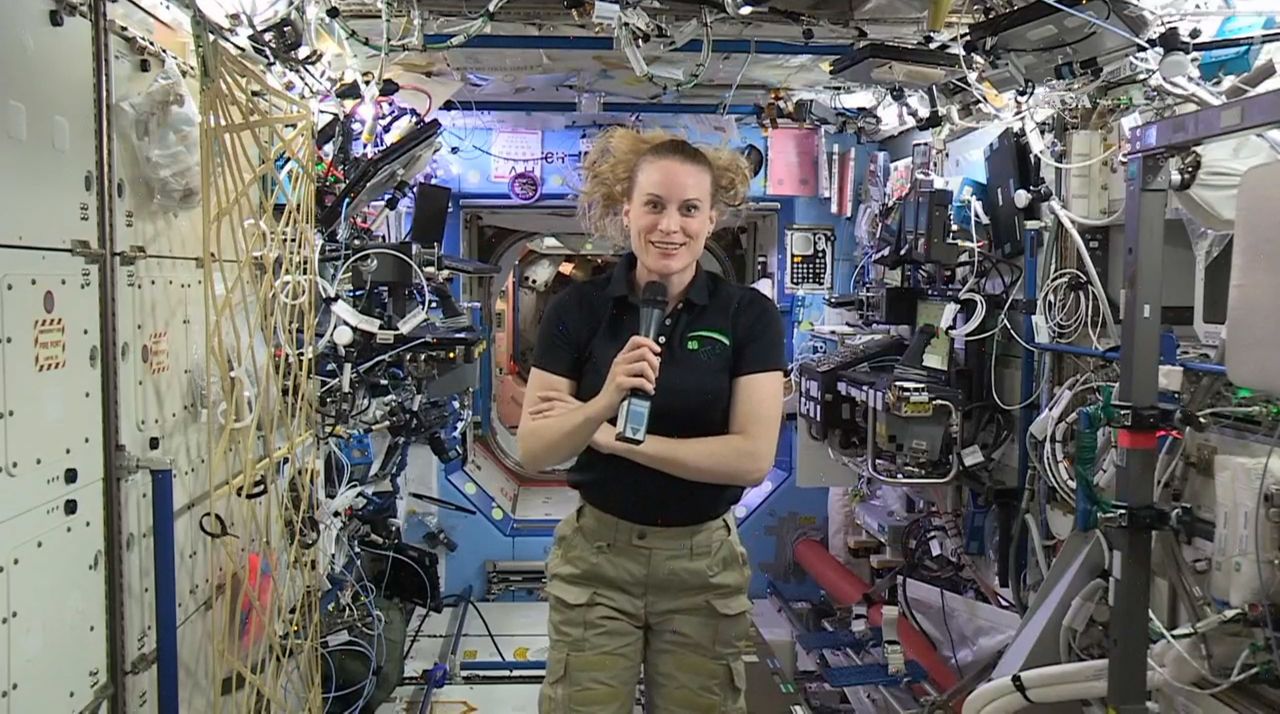 FILE: In this image from video made available by NASA, U.S. astronaut Kate Rubins speaks aboard the International Space Station during an interview on Thursday, Sept. 22, 2016. (NASA via AP)