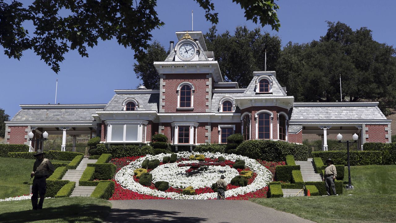 Workers standby at the train station at Neverland Ranch in Los Olivos, Calif. on July 2, 2009 (AP Photo/Carolyn Kaster, File)