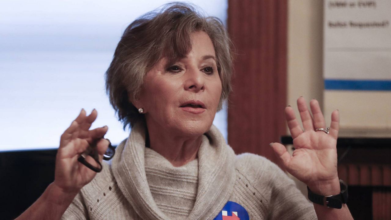 Retiring Sen. Barbara Boxer, D-Calif., speaks to volunteers at a home serving as a canvassing site to train and organize supporters of presidential candidate Hillary Clinton, Oct. 29, 2016, in Cincinnati. (AP Photo/John Minchillo)