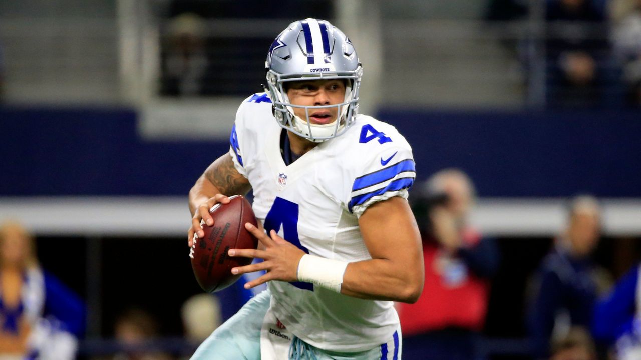 Dallas Cowboys quarterback Dak Prescott (4) scrambles out of the pocket in the first half of an NFL football game against the Tampa Bay Buccaneers on Sunday, Dec. 18, 2016, in Arlington, Texas. (AP Photo/Ron Jenkins)