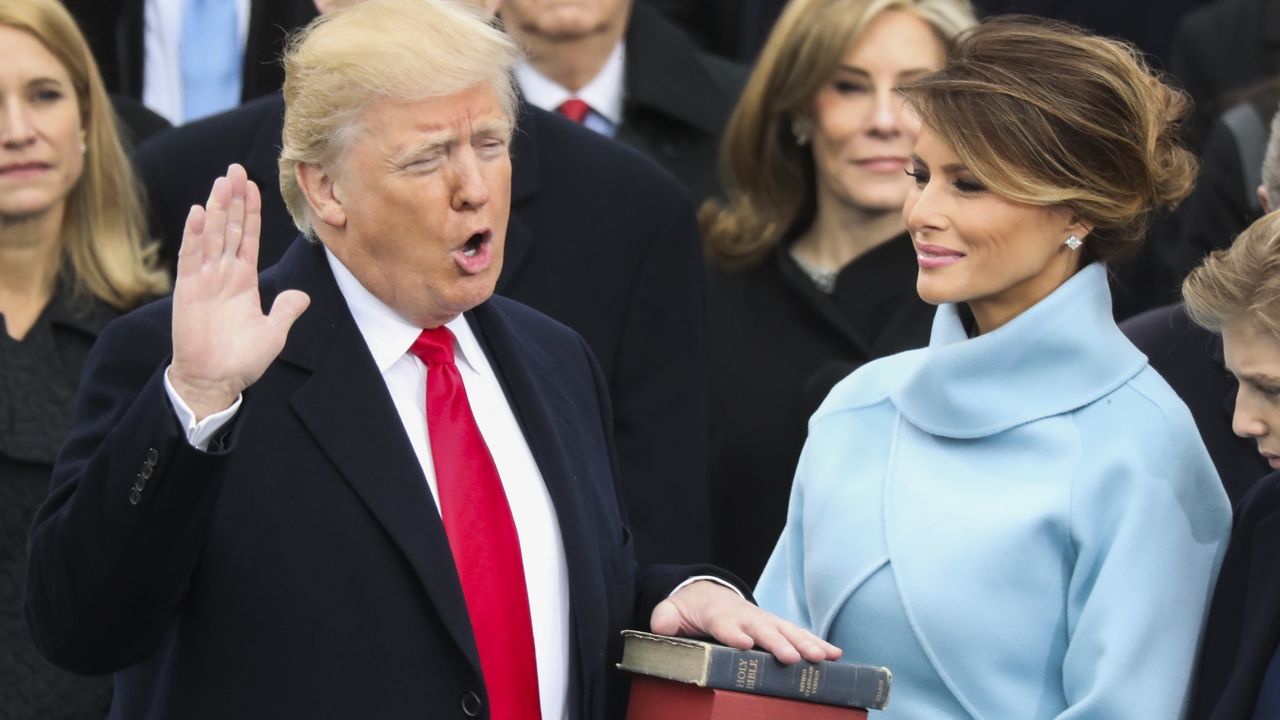 Donald Trump is sworn in as the 45th president of the United States by Chief Justice John Roberts as Melania Trump looks on during the 58th Presidential Inauguration at the U.S. Capitol in Washington, Friday, Jan. 20, 2017. (AP Photo/Matt Rourke) '