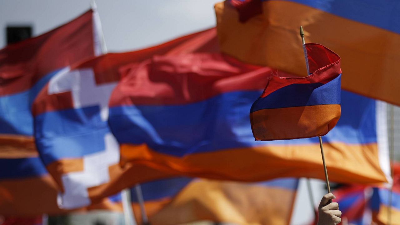 Marchers demonstrated outside the Turkish Consulate to protest the deaths of an estimated 1.5 million Armenians under the Ottoman Empire, Monday, April 24, 2017, in Los Angeles. (AP/Jae C. Hong)  