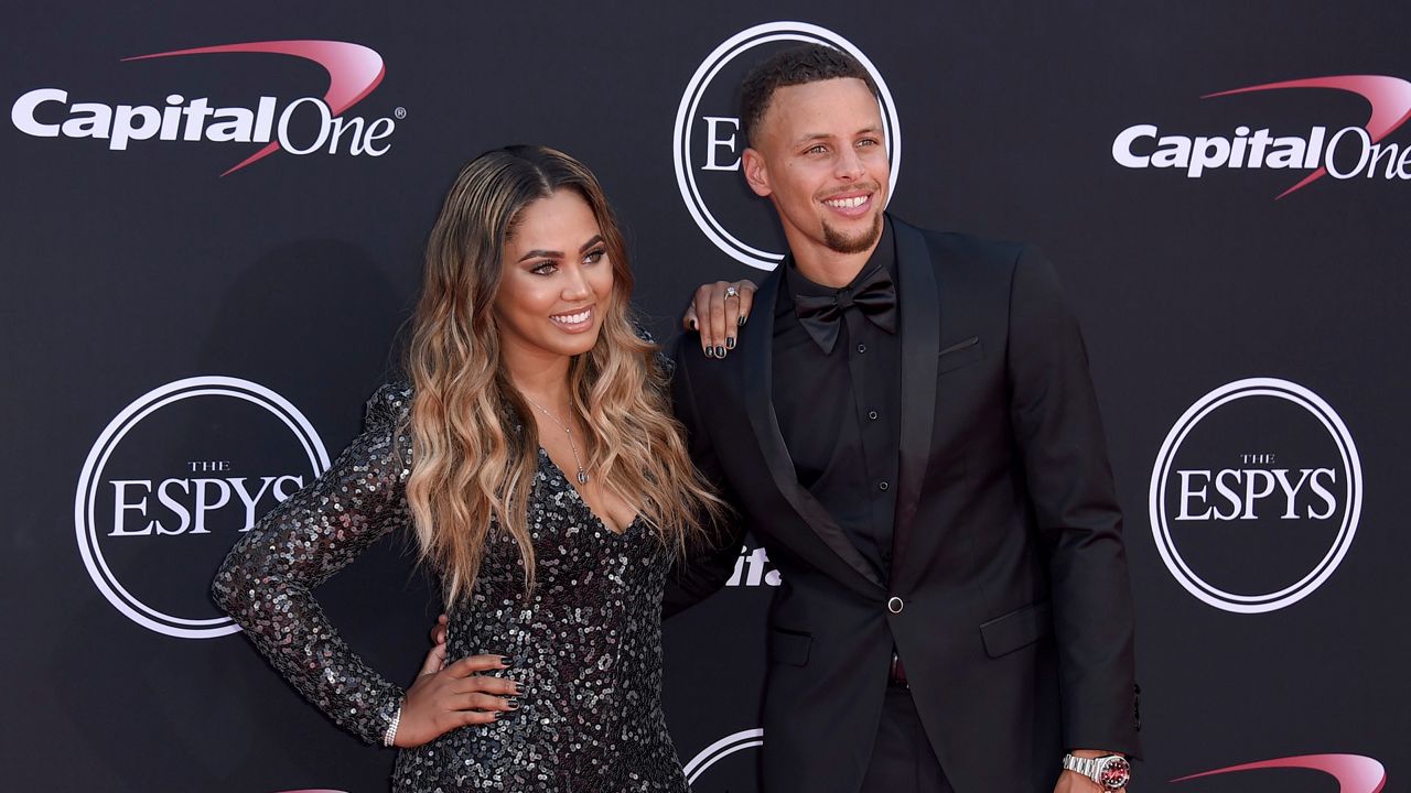 Stephen Curry, right, and Ayesha Curry arrive at the ESPYS at the Microsoft Theater on July 12, 2017, in Los Angeles. (Photo by Jordan Strauss/Invision/AP)