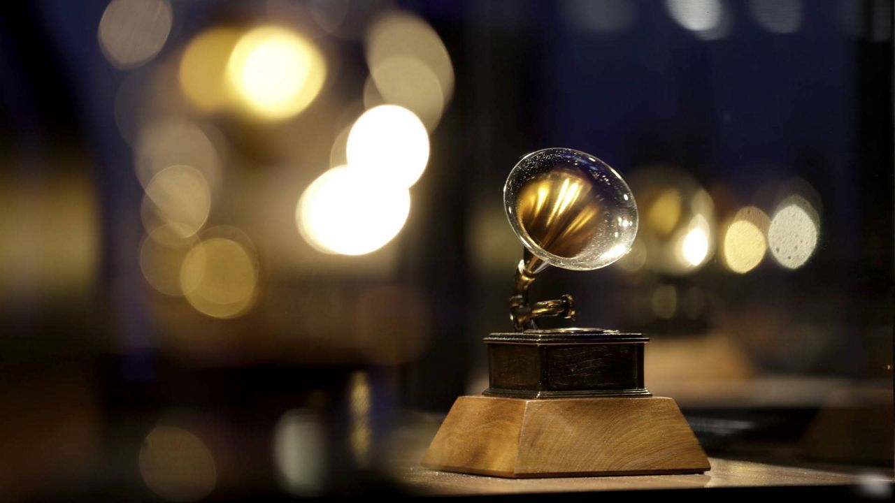 A Grammy award on display at the Grammy Museum Experience at Prudential Center in Newark, N.J. (AP Photo/Julio Cortez)