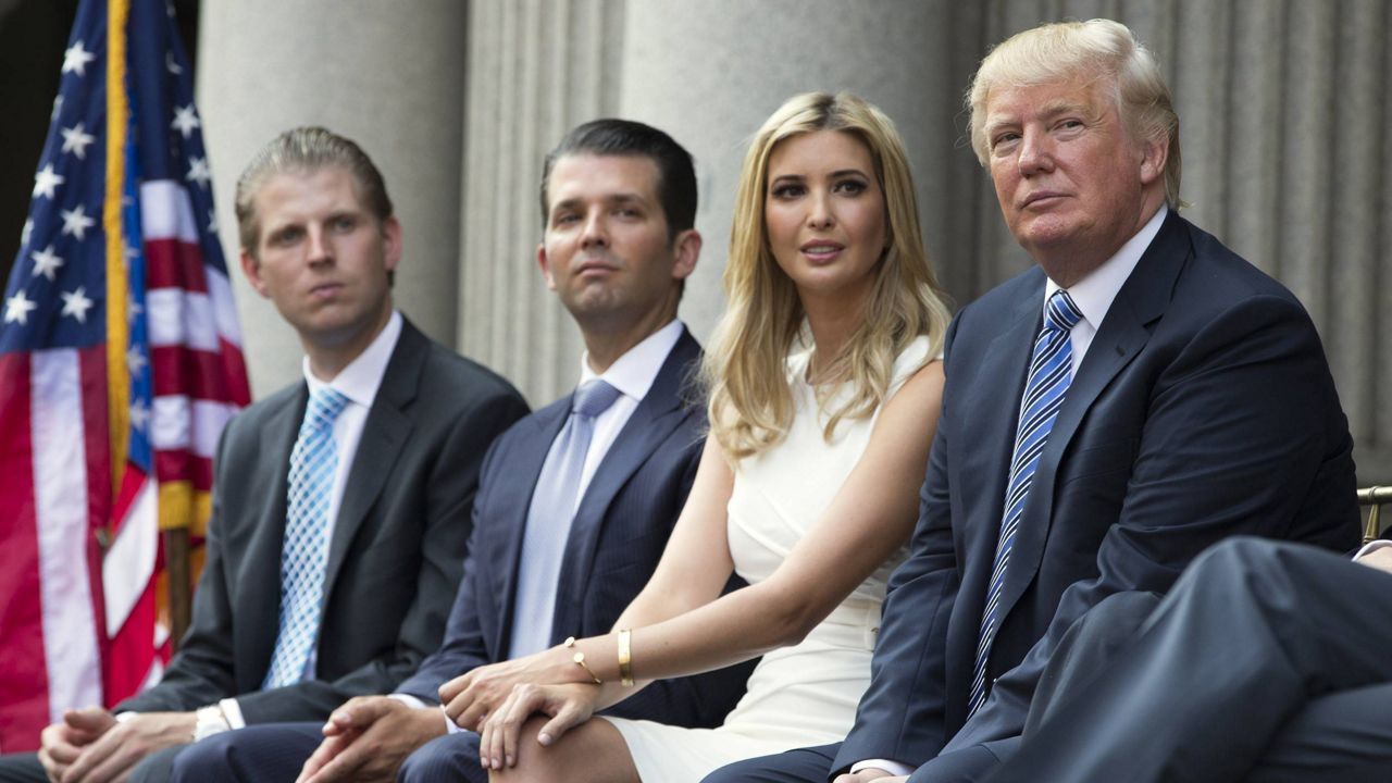Donald Trump with children Ivanka, Donald Jr. and Eric in 2014 (AP Photo/Evan Vucci, File)
