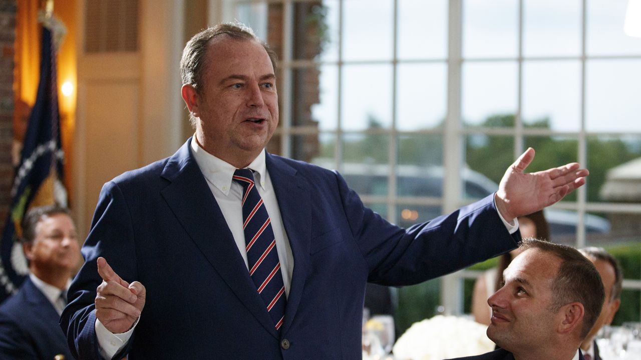 File Photo - Newsmax CEO Chris Ruddy speaks during a dinner meeting with President Donald Trump and other business leaders, Tuesday, Aug. 7, 2018, at Trump National Golf Club in Bedminster, N.J. (AP Photo/Carolyn Kaster)