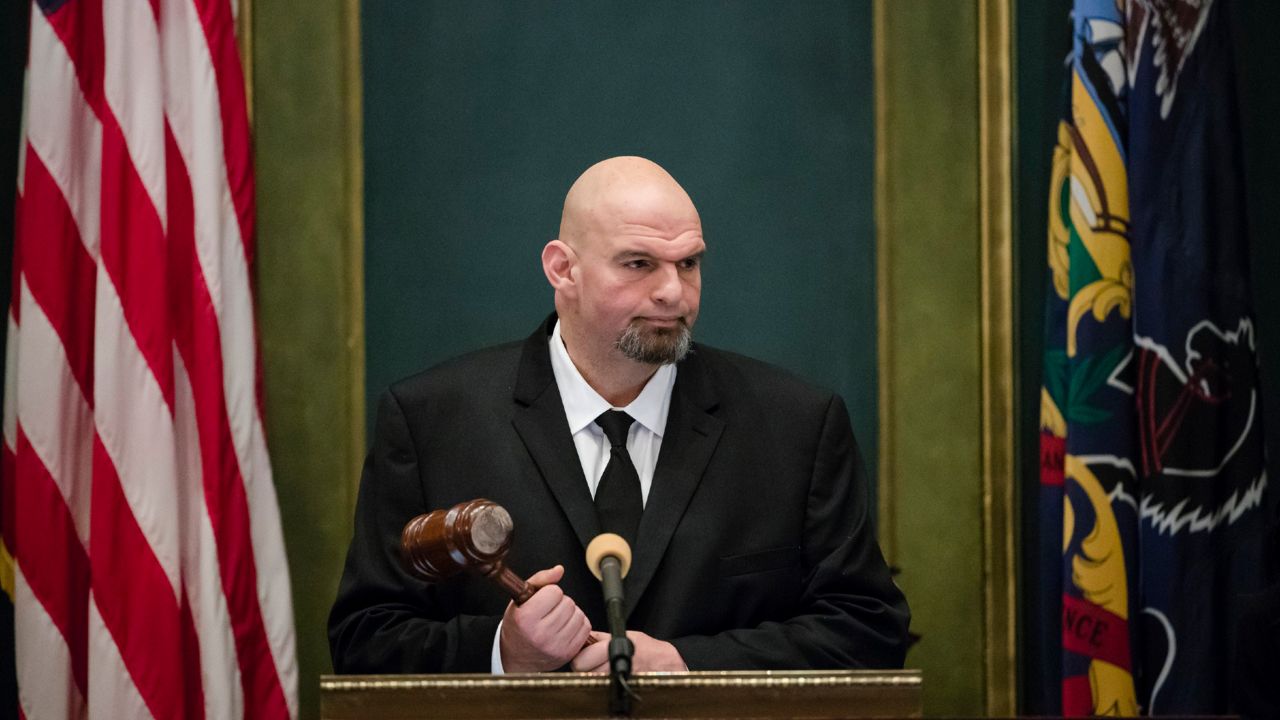 Pennsylvania Lieutenant Governor John Fetterman holds a gavel after he was sworn into office on Tuesday, Jan. 15, 2019, at the state Capitol in Harrisburg, Pa. (AP Photo/Matt Rourke)