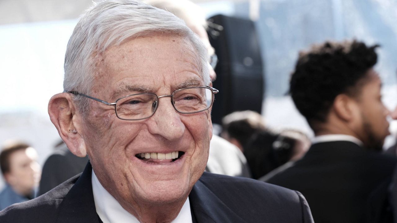 Billionaire philanthropist Eli Broad, arrives for a groundbreaking ceremony for The Grand, a long-delayed massive development in downtown Los Angeles on Monday, Feb. 11, 2019. Broad told attendees Monday that the project stems from a vision of Grand Avenue becoming the arts, cultural and civic district for the region. (AP Photo/Richard Vogel)