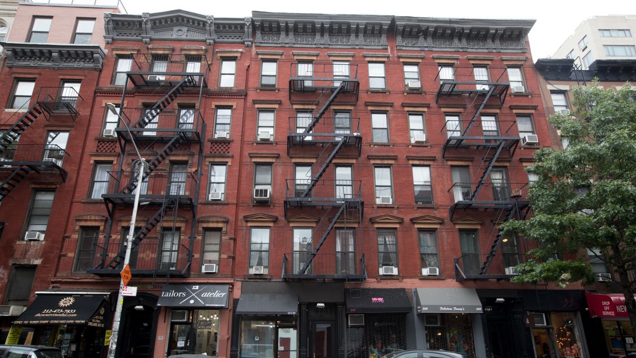 FILE - This Aug. 31, 2018 file photo shows Kushner family real estate firm-owned buildings 333, center, and 335 East 9th Street in the East Village neighborhood of New York. On Tuesday, March 19, 2019, a New York City councilman accused the company of putting tenants in danger by allowing several of its building to avoid safety inspections. (AP Photo/Mary Altaffer, File)