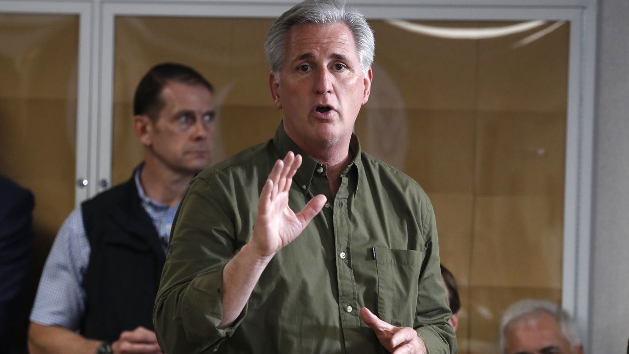 Then-House Minority Leader Kevin McCarthy of Calif., speaks as then-President Donald Trump participates in a roundtable on immigration and border security at the U.S. Border Patrol Calexico Station in Calexico, Calif., Friday April 5, 2019. (AP Photo/Jacquelyn Martin)