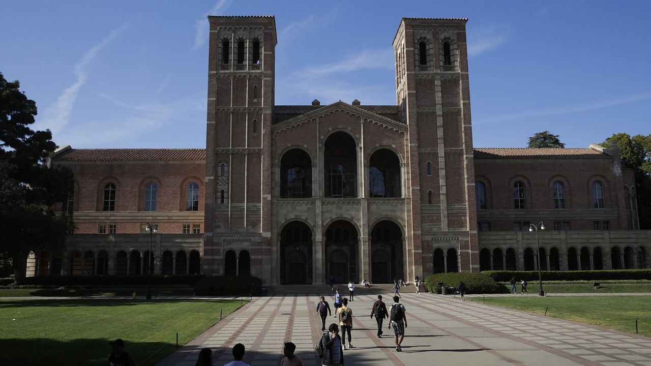 Students walk in front of UCLA campus building