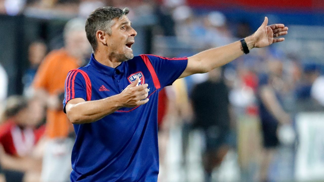 FC Dallas head coach Luchi Gonzalez instructs his team during a defensive transition in the first half of an MLS soccer match against the Vancouver Whitecaps in Frisco, Texas, Wednesday, June 26, 2019. (AP Photo/Tony Gutierrez)