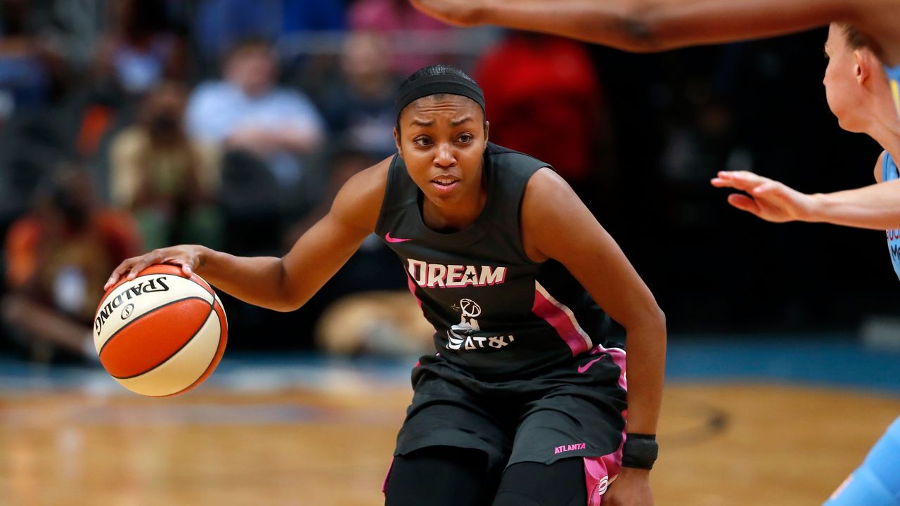 Atlanta Dream guard Renee Montgomery, one of the team's new owners. Montgomery is the first former player to serve as a WNBA owner and executive. (AP Photo / John Bazemore)