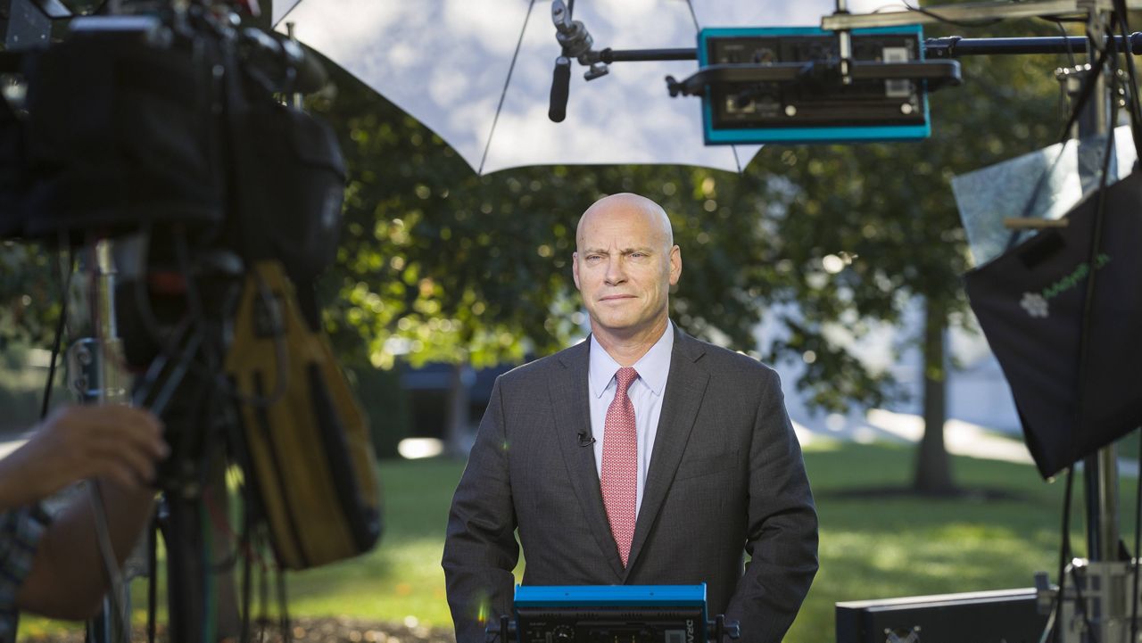 Marc Short, chief of staff for Vice President Mike Pence, stands for a television interview at the White House, Monday, Sept. 16, 2019, in Washington. (AP Photo/Alex Brandon)