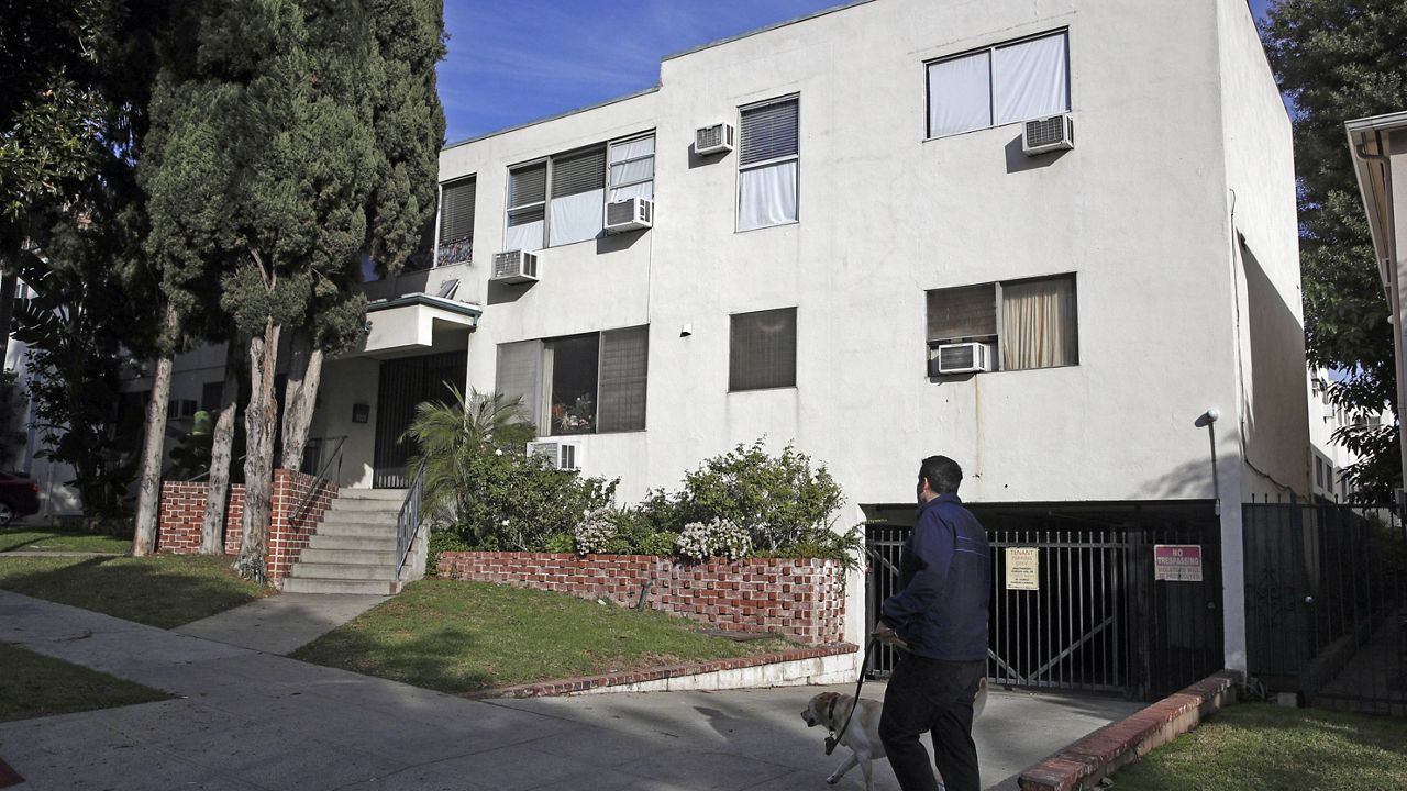 This Jan. 8, 2019, file photo shows the building housing the apartment of Ed Buck in West Hollywood, Calif., following the death of a man the previous day. (AP Photo/Jae C. Hong, File)