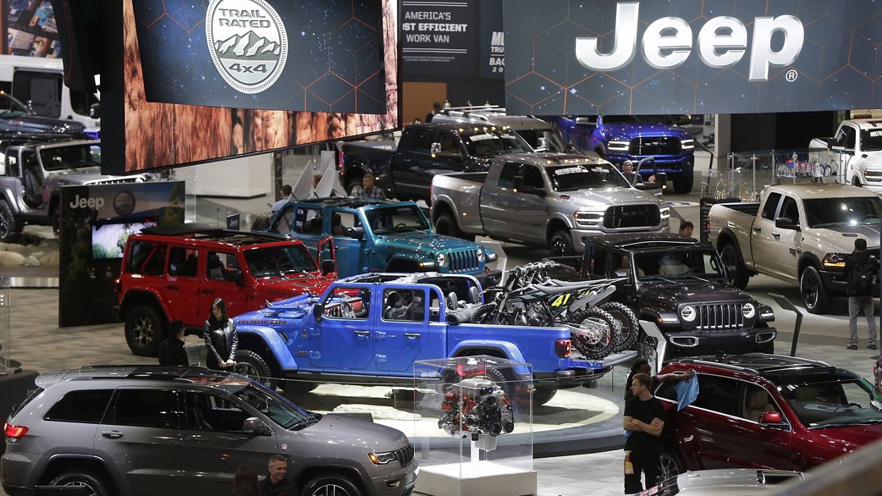 Vehicles are shown at the floor of the AutoMobility LA Auto Show Thursday, Nov. 21, 2019, in Los Angeles. (AP Photo/Damian Dovarganes)