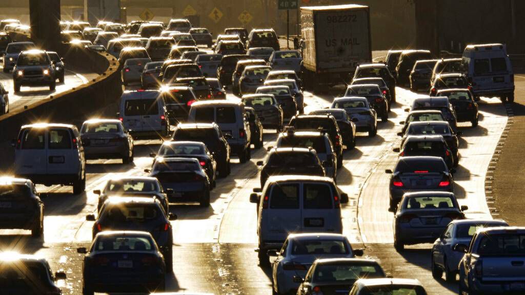 In this Nov. 15, 2016, file photo morning rush hour traffic moves along the southbound lanes along US 101 near downtown Los Angeles. (AP Photo/Richard Vogel, File)