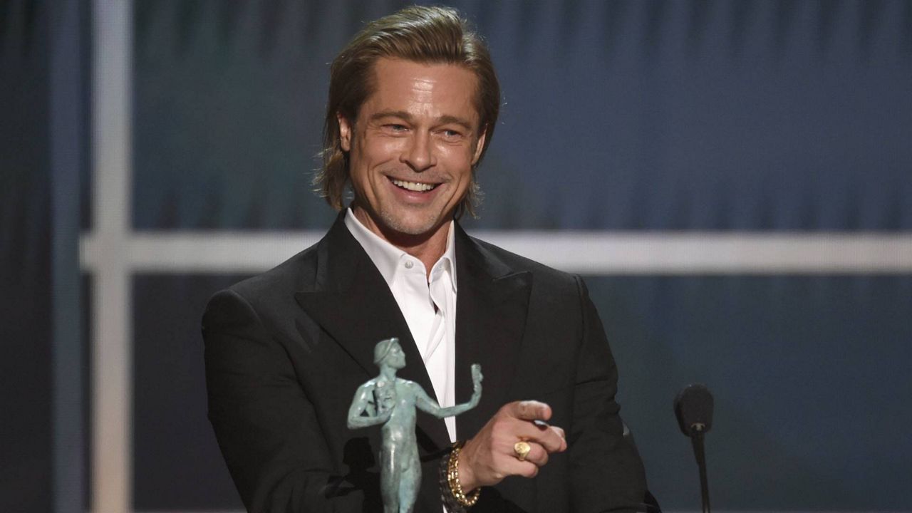 Brad Pitt accepts the award for outstanding performance by a male actor in a supporting role at the Screen Actors Guild Awards at the Shrine Auditorium & Expo Hall on Jan. 19, 2020, in Los Angeles. (Photo/Chris Pizzello)