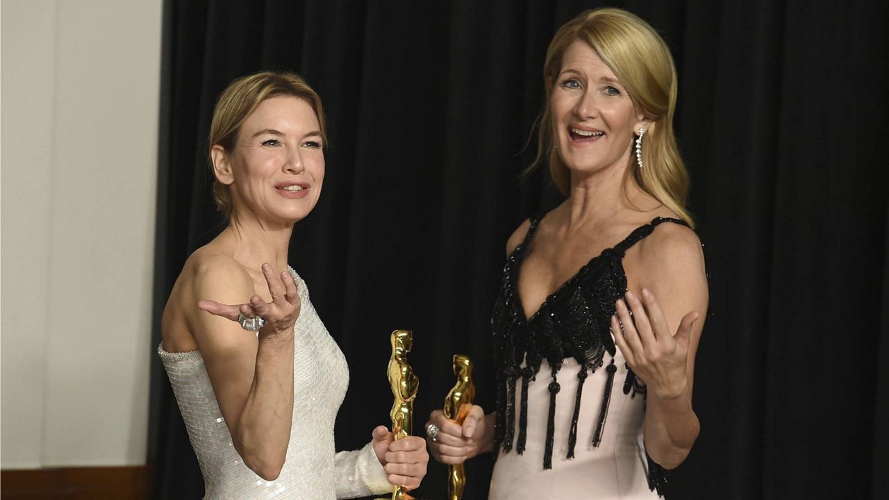 Renee Zellweger and Laura Dern pose in the press room at the Oscars on Sunday, Feb. 9, 2020, at the Dolby Theatre in Los Angeles. (Photo by Jordan Strauss/Invision/AP)