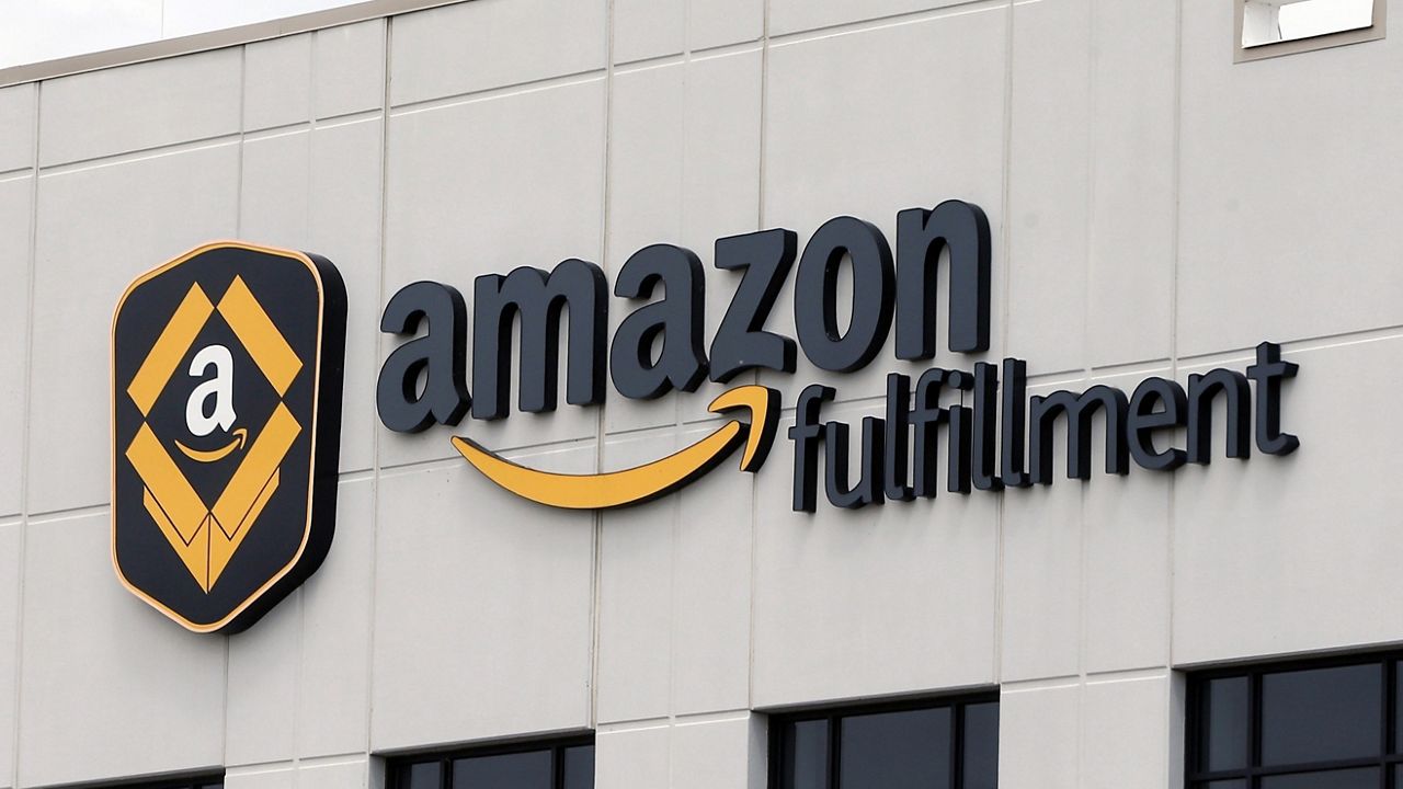 FILE - This July 8, 2019 file photo, shows the Amazon Fulfillment warehouse in Shakopee, Minn. (AP Photo/Jim Mone, File)