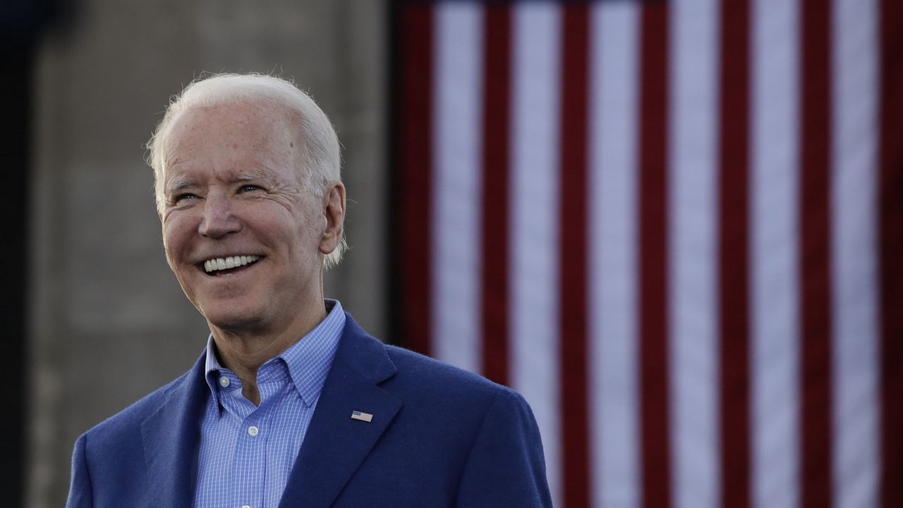 FILE - In this March 7, 2020, file photo Democratic presidential candidate former Vice President Joe Biden acknowledges the crowd during a campaign rally in Kansas City, Mo. (AP Photo/Charlie Riedel, File)