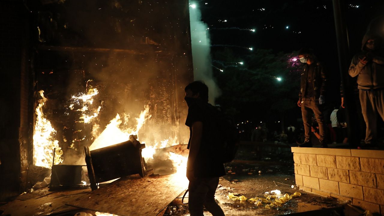 Fires at the 3rd Precinct of the Minneapolis Police Department, Thursday, May 28, 2020, in Minneapolis. (AP Photo/John Minchillo)