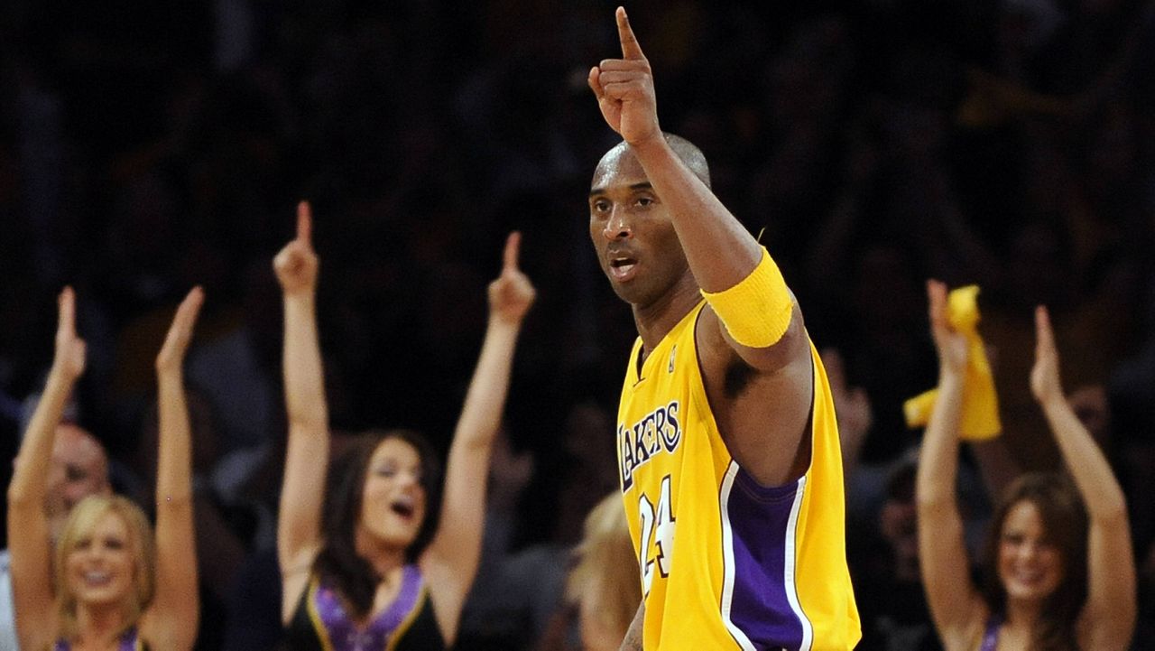In this May 27, 2010, file photo, Los Angeles Lakers guard Kobe Bryant reacts after Pau Gasol dunked during the second half of Game 5 of the NBA basketball Western Conference finals against the Phoenix Suns in Los Angeles. (AP Photo/Mark J. Terrill, File)