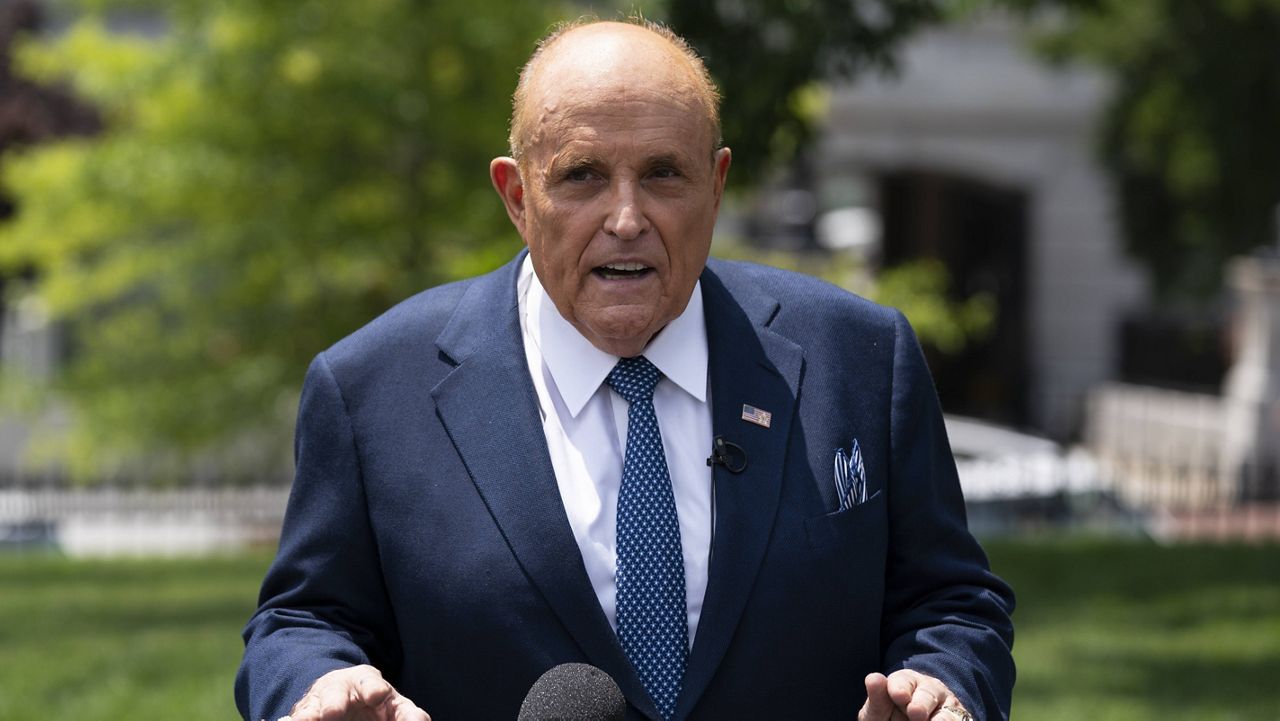 Rudy Giuliani, a personal attorney for President Donald Trump, talks with reporters outside the White House on July 1, 2020. (AP Photo/Evan Vucci)
