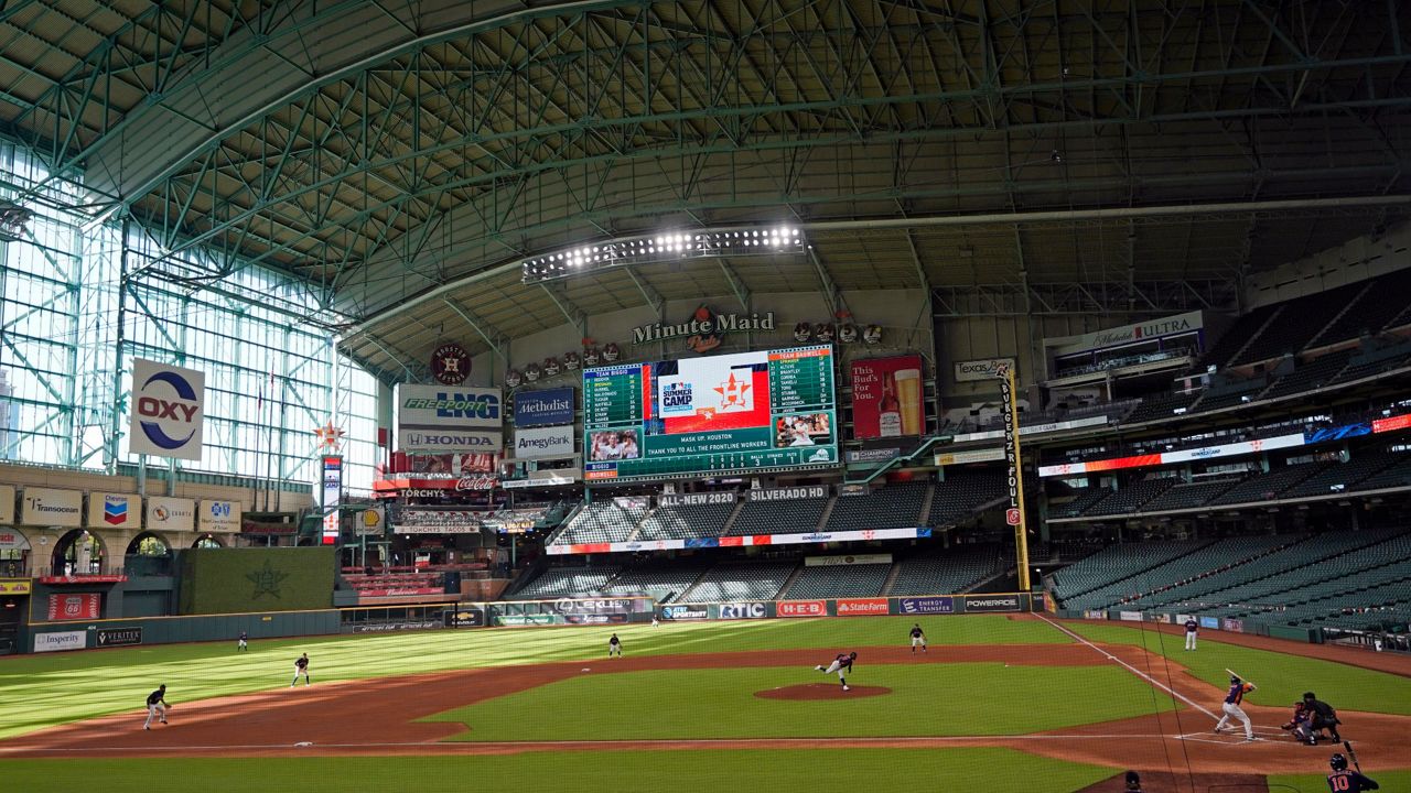 The Houston Astros play an intrasquad baseball game inside Minute Maid Park Monday, July 13, 2020, in Houston. (AP Photo/David J. Phillip)