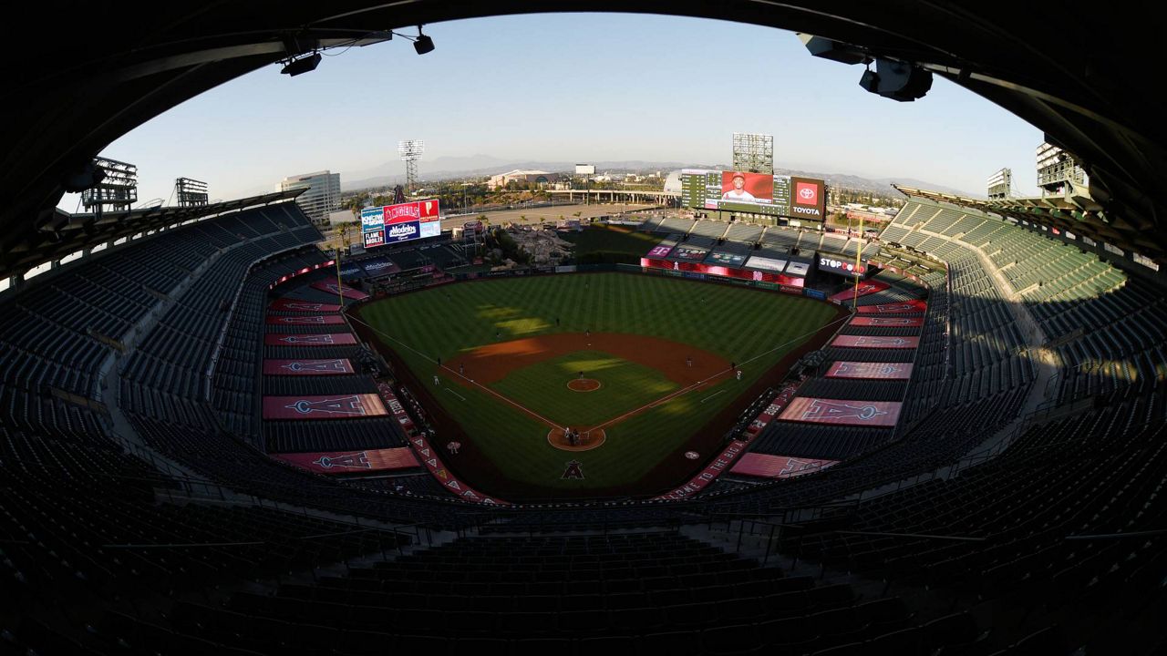 An overall view of Angel's Stadium of Anaheim during the second inning of a baseball game between the Los Angeles Angels and Seattle Mariners in Anaheim, Calif., July 28, 2020. (AP Photo/Kelvin Kuo)