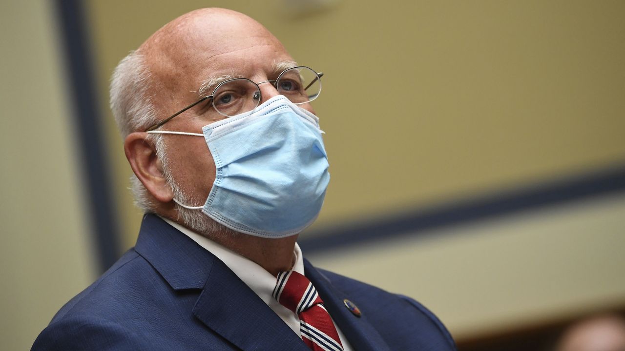 Dr. Robert Redfield, director of the Centers for Disease Control and Prevention (CDC), listens during a House Subcommittee on the Coronavirus crisis hearing, Friday, July 31, 2020 on Capitol Hill in Washington. (Kevin Dietsch/Pool via AP)