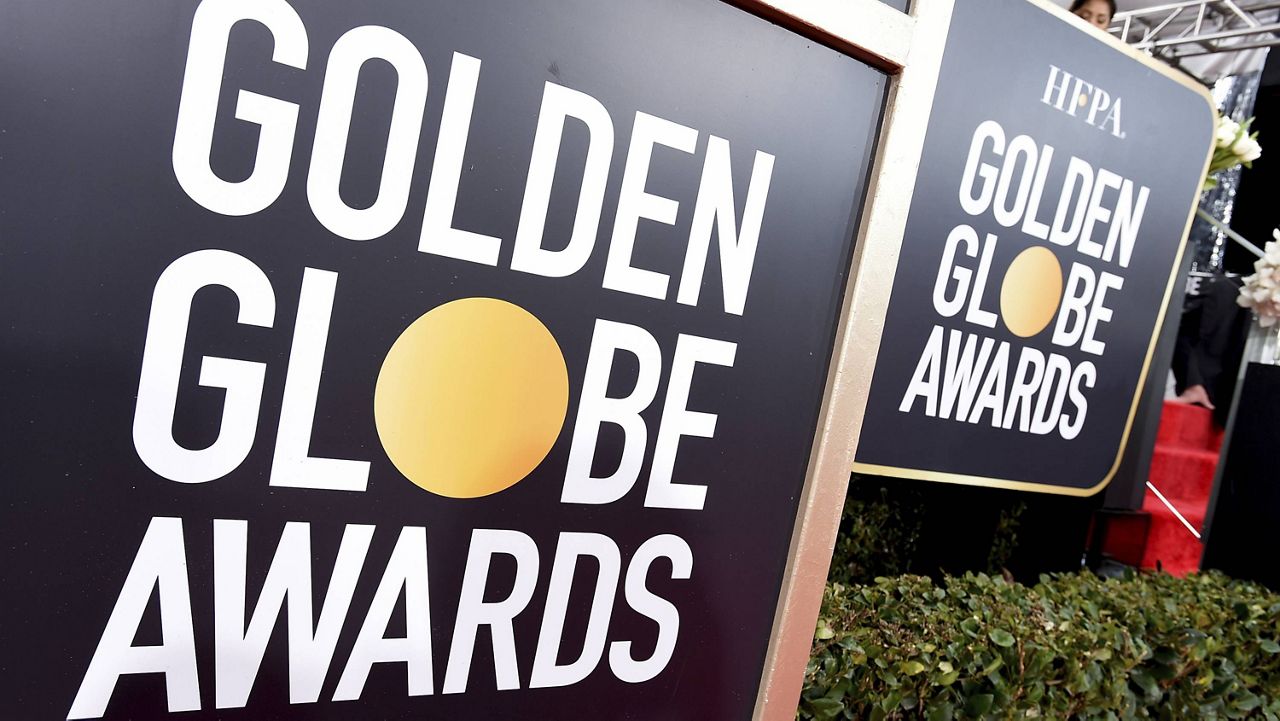 Golden Globes signage appears on the red carpet at the 76th annual Golden Globe Awards on Jan. 6, 2019, in Beverly Hills, Calif. (Photo by Jordan Strauss/Invision/AP, File)