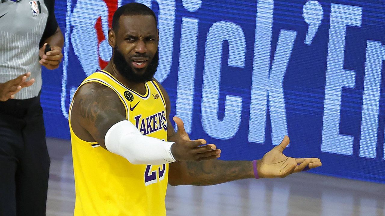 LeBron James of the Los Angeles Lakers reacts to a call against the Oklahoma City Thunder during the second half of an NBA basketball game Wednesday, Aug. 5, 2020, in Lake Buena Vista, Fla. (Kevin C. Cox/Pool Photo via AP)