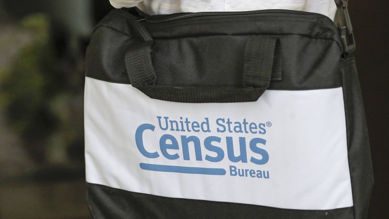 A half-million census takers head out en mass this week to knock on the doors of households that haven't yet responded to the 2020 census. (AP Photo/John Raoux)