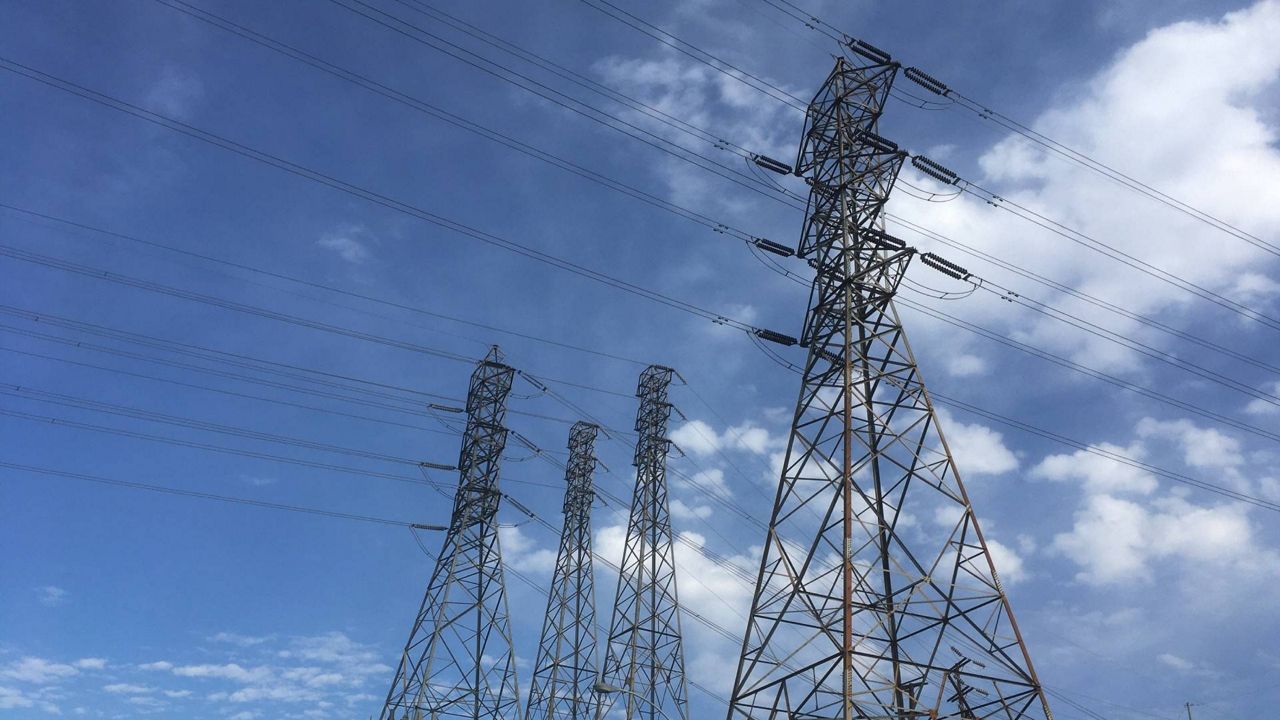 In this August 15, 2020 photo, electrical grid transmission towers are seen in Pasadena, Calif. (AP Photo/John Antczak, File)