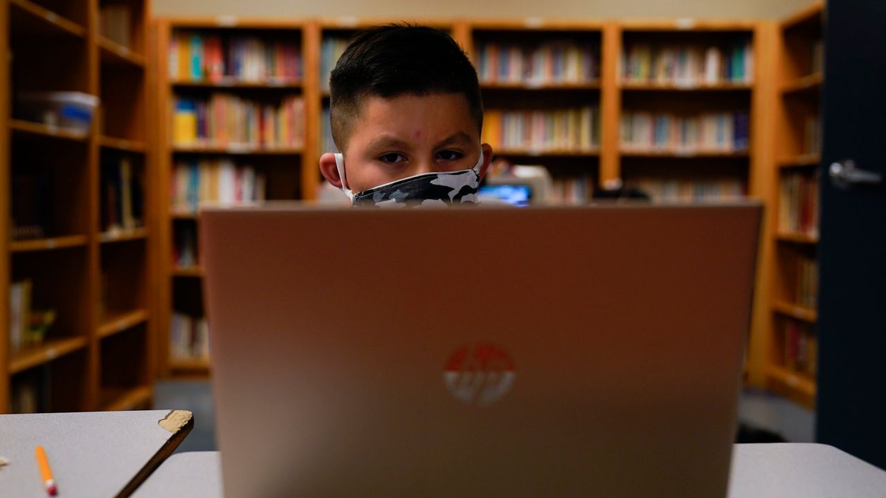 A Los Angeles Unified School District student attends an online class at Boys & Girls Club of Hollywood in Los Angeles, Aug. 26, 2020. (AP/Jae C. Hong)