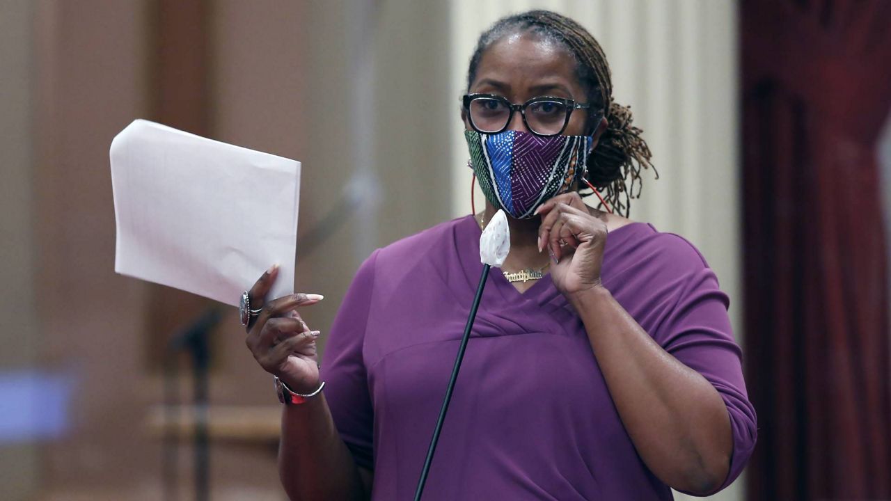 In this June 25, 2020 photo, State Sen. Holly Mitchell, D-Los Angeles, discusses one of the more than one dozen budget trailer bills before the Senate at the Capitol in Sacramento, Calif. (AP Photo/Rich Pedroncelli)
