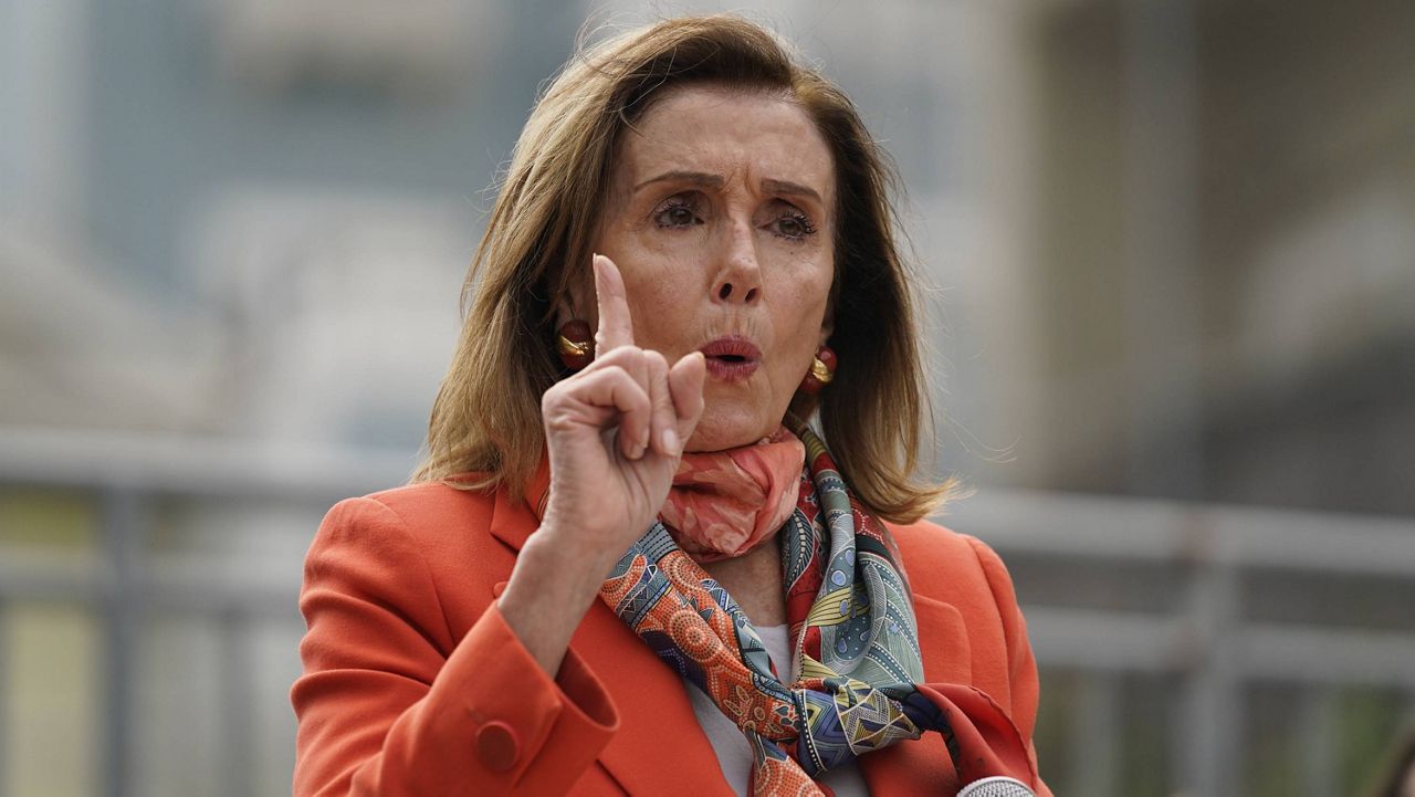 House Speaker Nancy Pelosi gestures while speaking about her visit to a hair salon during a news conference in San Francisco. (AP Photo/Eric Risberg)