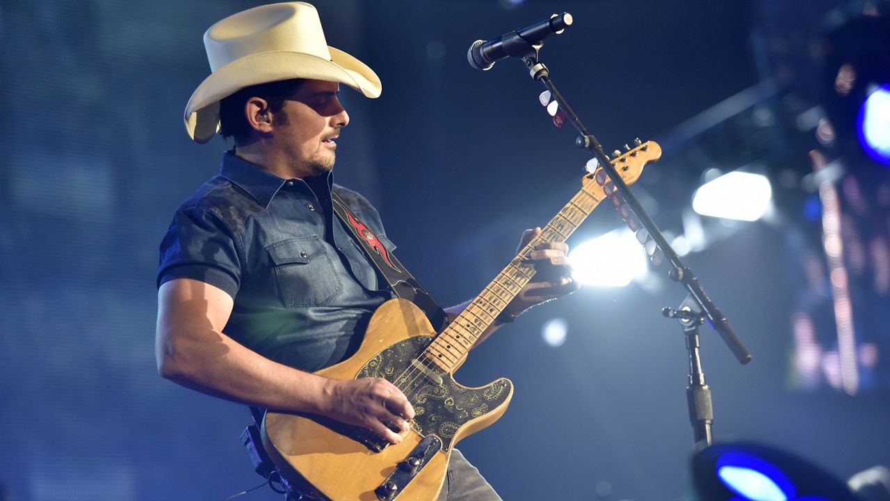 Brad Paisley performing in Rosemont, Ill. on Feb. 24, 2018. (Photo by Rob Grabowski/Invision/AP)