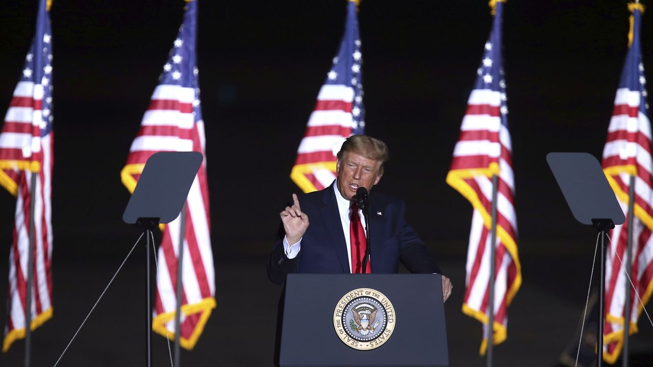 President Donald Trump speaks during a campaign rally at the Minden-Tahoe Airport in Minden, Nev., Saturday, Sept. 12, 2020. (AP Photo/Lance Iversen)