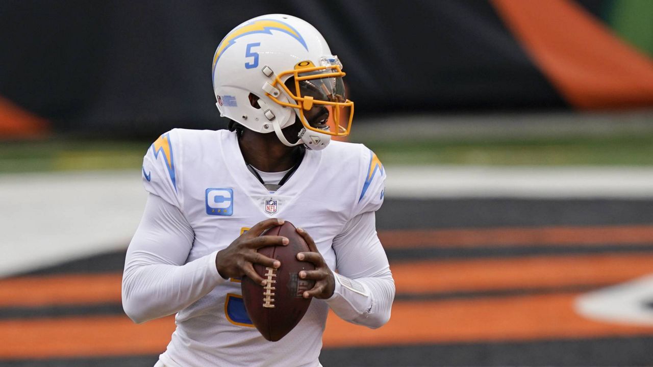 L.A. Chargers quarterback Tyrod Taylor looks to throw during the first half of an NFL football game against the Cincinnati Bengals, Sunday, Sept. 13, 2020, in Cincinnati. (AP/Bryan Woolston)