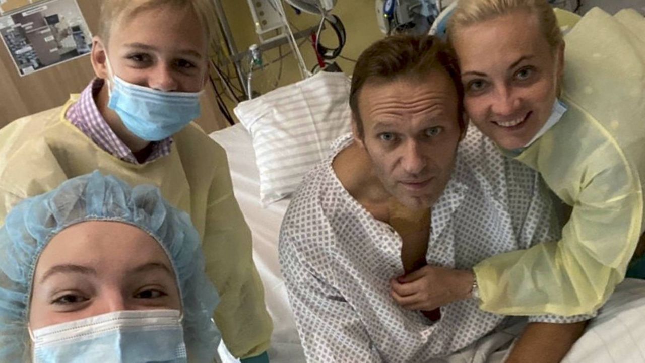 Alexei Navalny poses for a photo from his hospital bed with his wife, son and daughter. (Navalny instagram via AP)