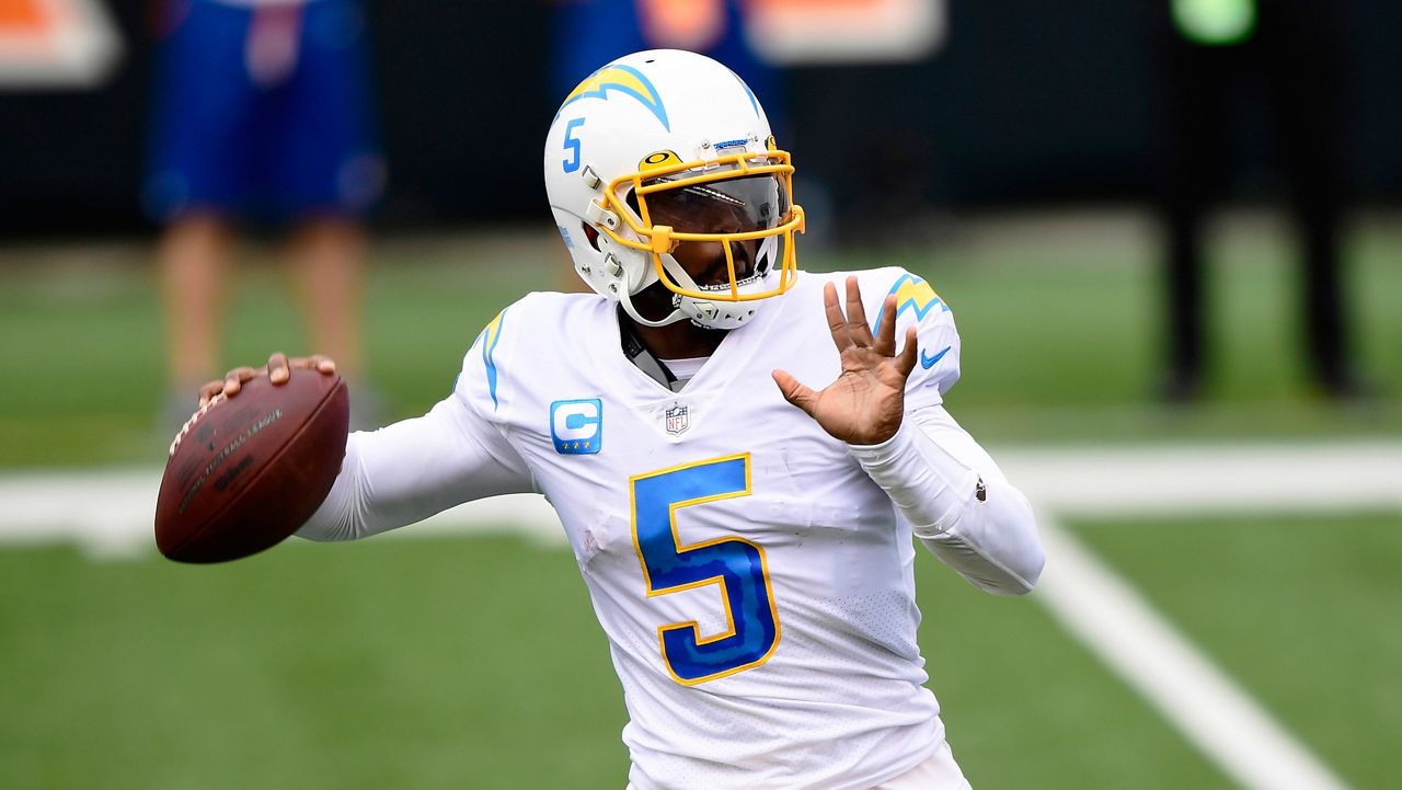 Los Angeles Chargers quarterback Tyrod Taylor (5) passes the ball during an NFL football game against the Cincinnati Bengals, Sunday, Sept. 13, 2020, in Cincinnati. (AP Photo/Emilee Chinn)