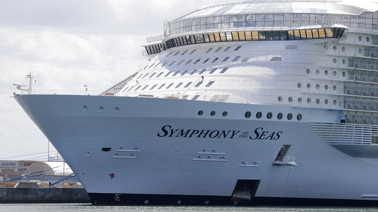 The Symphony of the Seas cruise ship is shown docked at PortMiami in May. (AP Photo/Wilfredo Lee, File)