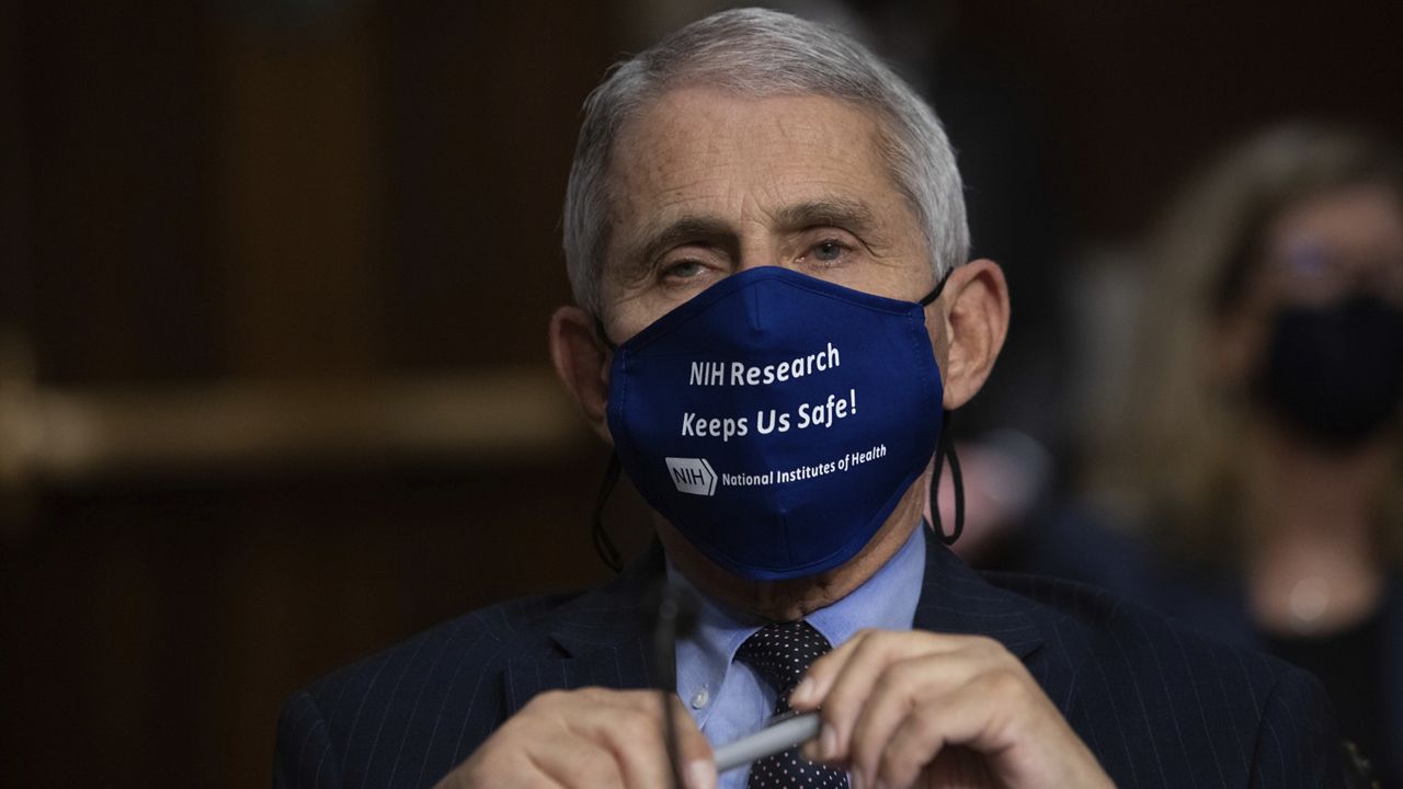 Dr. Anthony Fauci, Director of the National Institute of Allergy and Infectious Diseases at the National Institutes of Health, listens during a Senate Health, Education, Labor, and Pensions Committee Hearing on the federal government response to COVID-19 Capitol Hill on Wednesday, Sept. 23, 2020, in Washington. (Graeme Jennings/Pool via AP)