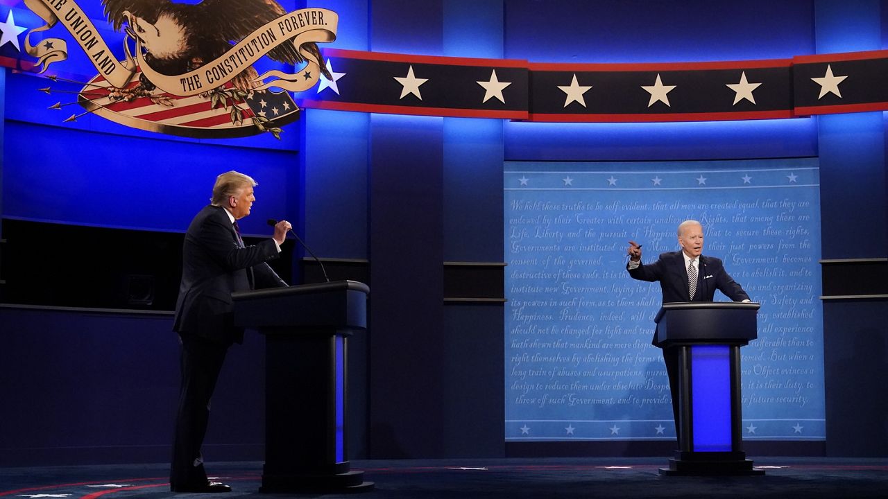 President Donald Trump, left, and Democratic presidential candidate former Vice President Joe Biden, right, during the first presidential debate Tuesday, Sept. 29, 2020, at Case Western University and Cleveland Clinic, in Cleveland, Ohio. (AP Photo/Julio Cortez)