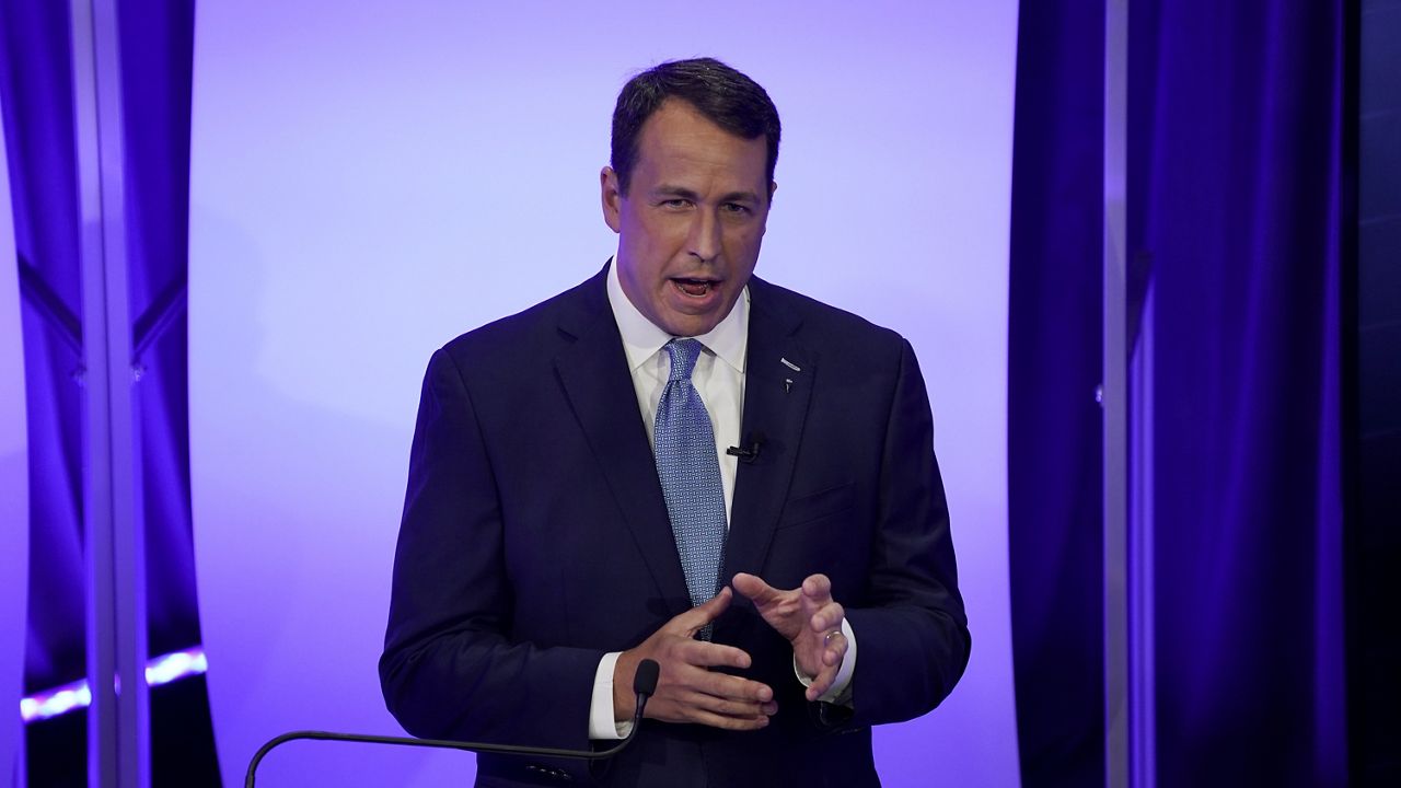 Democratic challenger Cal Cunningham talks during during a televised debate with U.S. Sen. Thom Tillis, R-N.C. Thursday, Oct. 1, 2020 in Raleigh, N.C. (AP Photo/Gerry Broome, POOL)