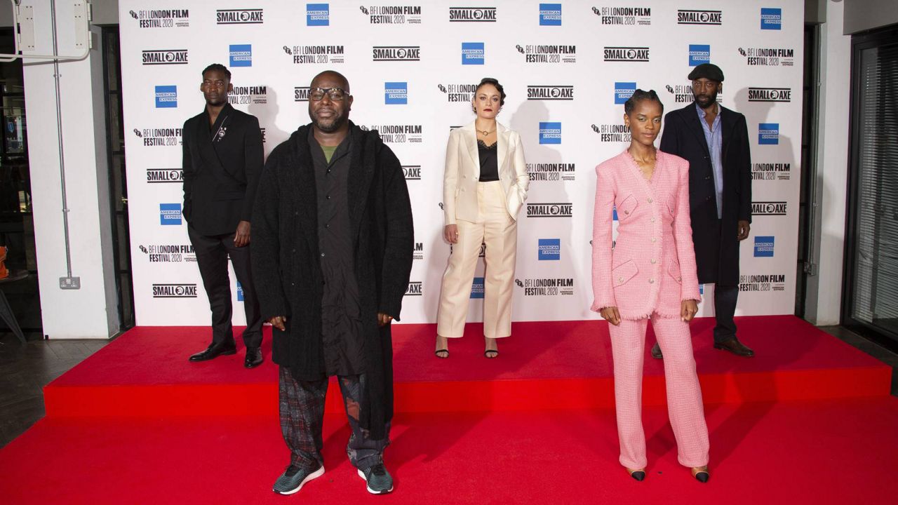 Actors from left to right, Malachi Kirby, Director Steve McQueen, Rochenda Sandall, Letitia Wright, and Shaun Parkes pose for photographers during the photo call for the film “Mangrove” as part of London Film Festival at the BFI Southbank in central London, Oct. 7, 2020. (Joel C Ryan/Invision/AP)