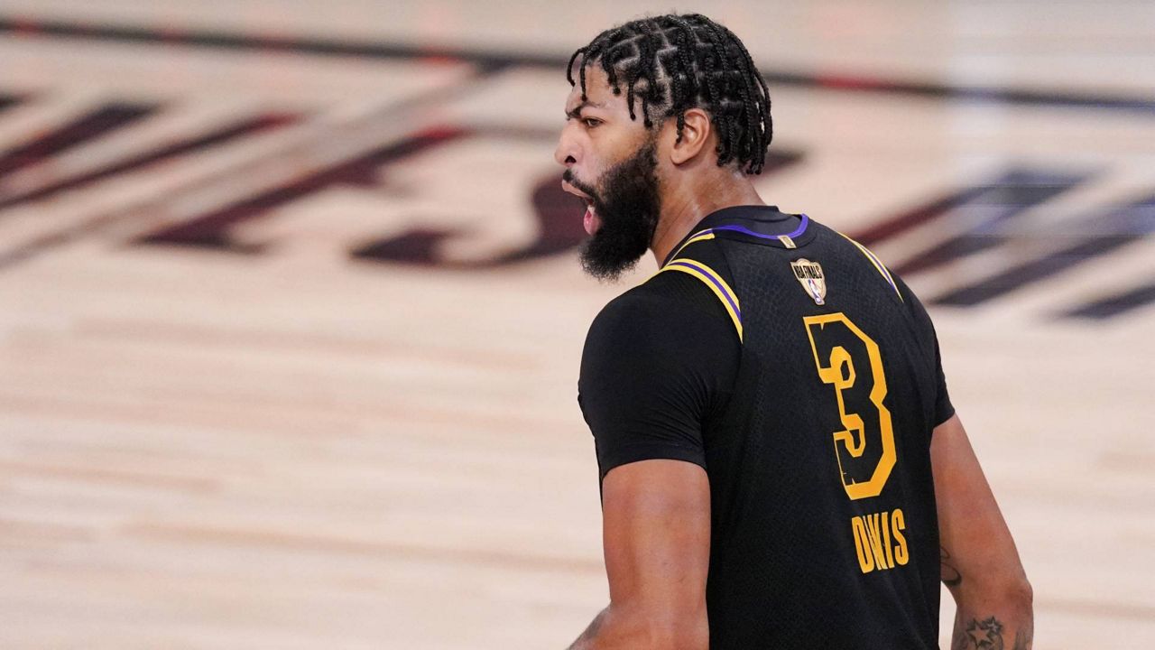 Anthony Davis celebrates during the second half in Game 5 of basketball's NBA Finals against the Miami Heat Friday, Oct. 9, 2020, in Lake Buena Vista, Fla. (AP/Mark J. Terrill)